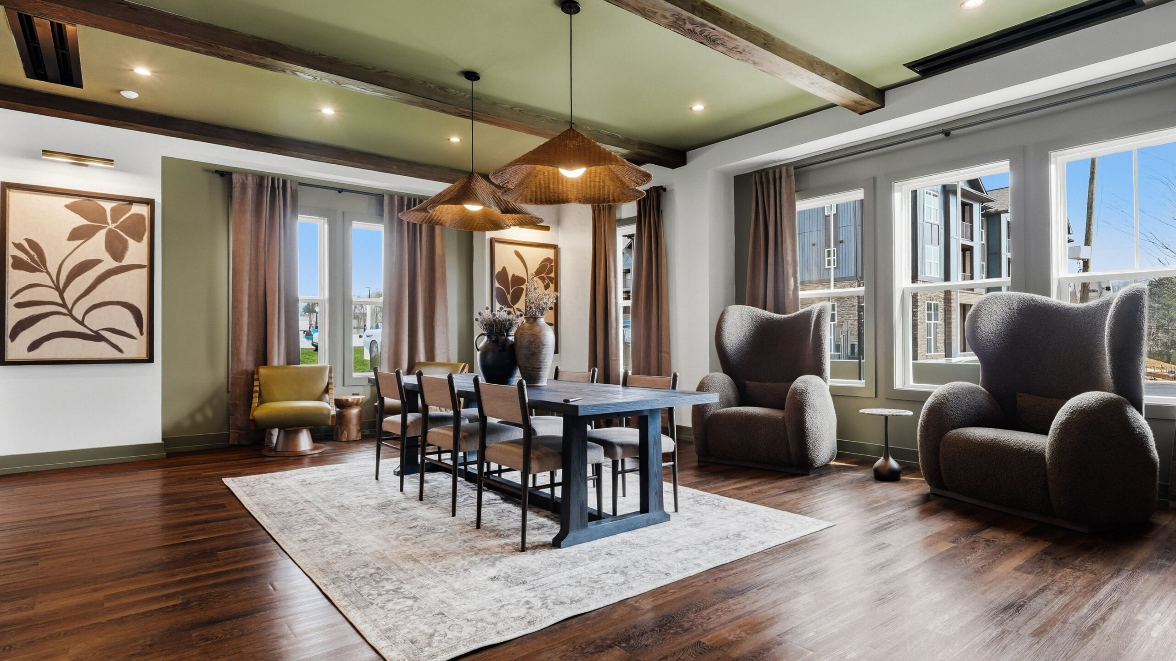 Hawthorne at Hixson smiling young man relaxing at home and using tablet