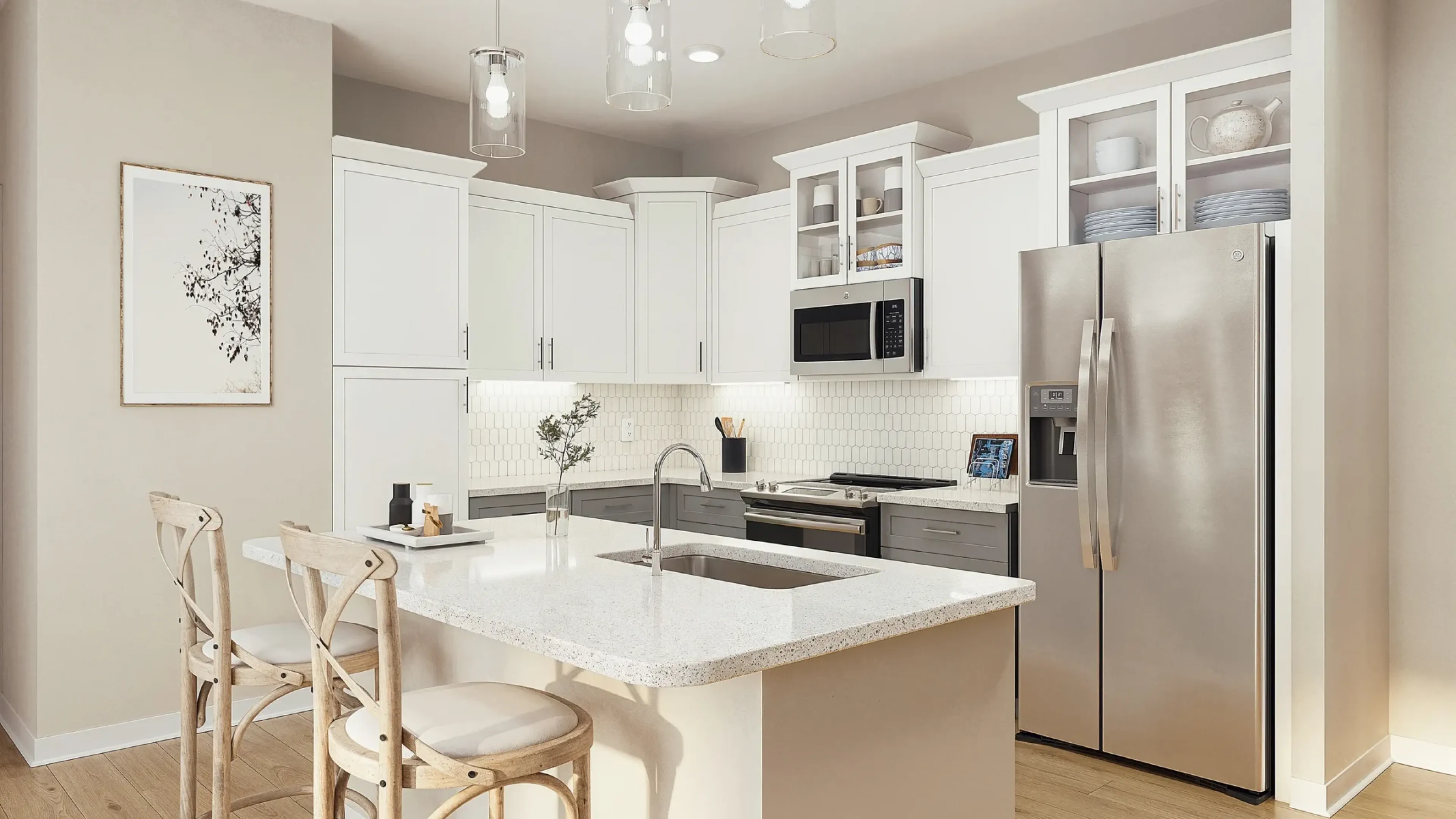Hawthorne at Hixson apartment kitchen area with wrap around kitchen island, stainless steel appliances, and ample cabinet storage