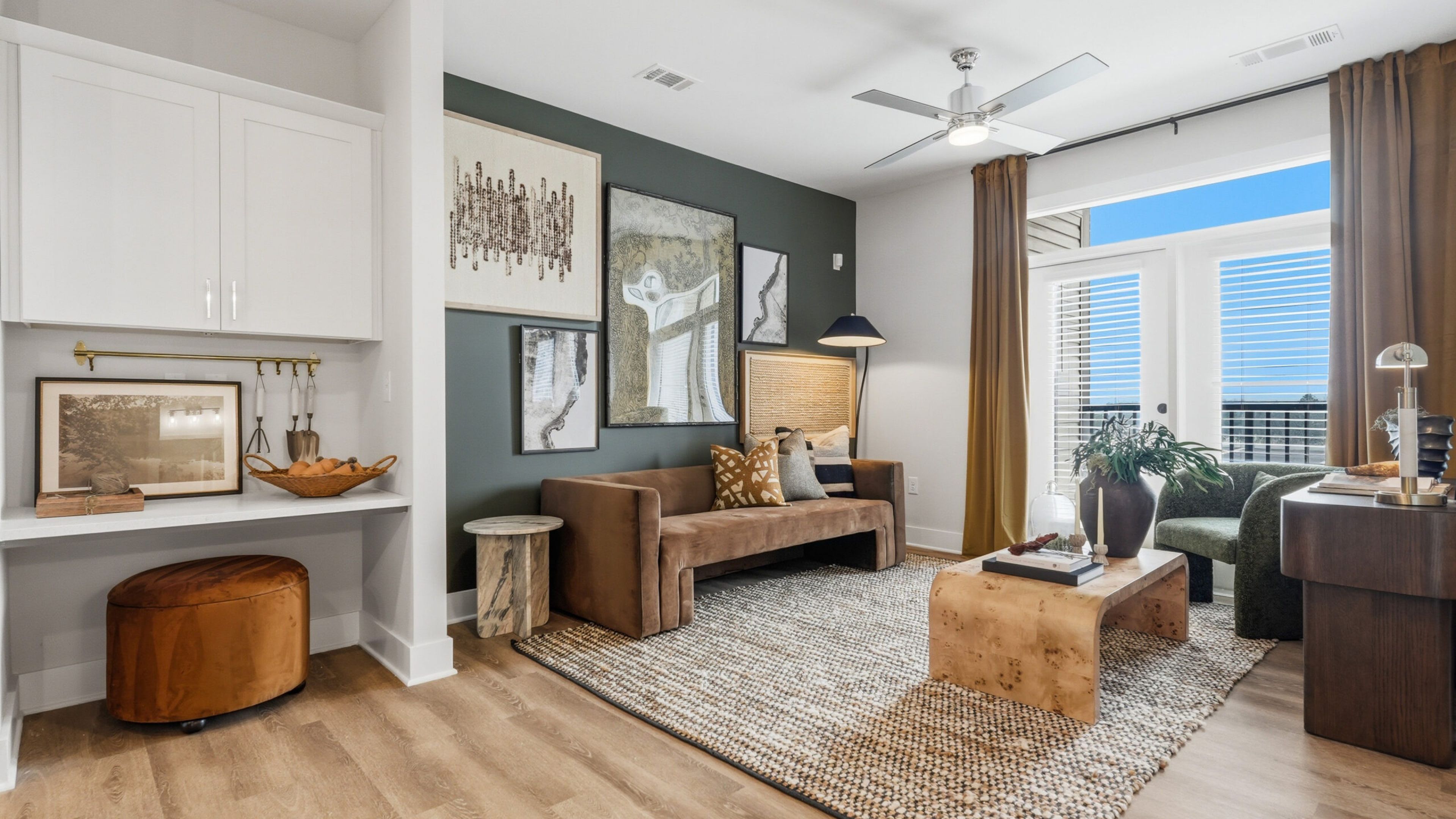 Hawthorne at Hixson apartment kitchen area with wrap around kitchen island, stainless steel appliances, and ample cabinet storage